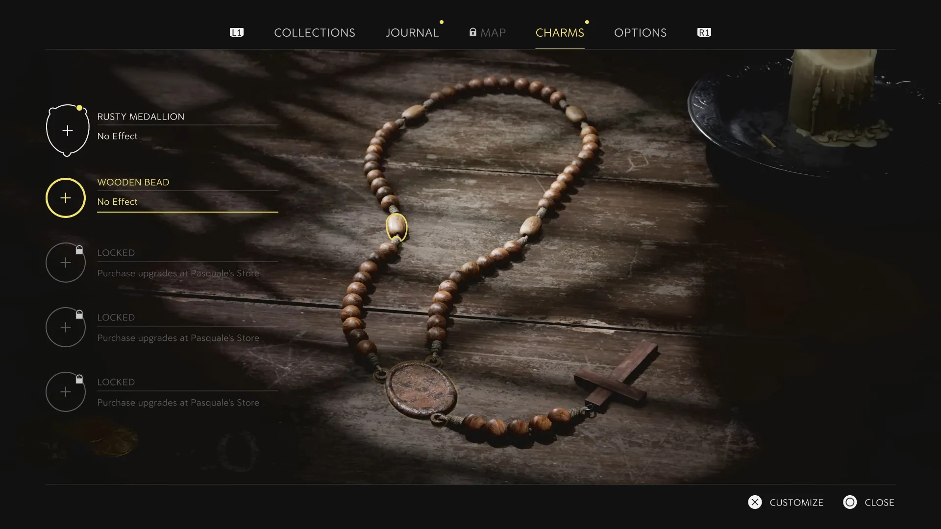 Charms in the pause menu: medallion and bead slots on the rosary